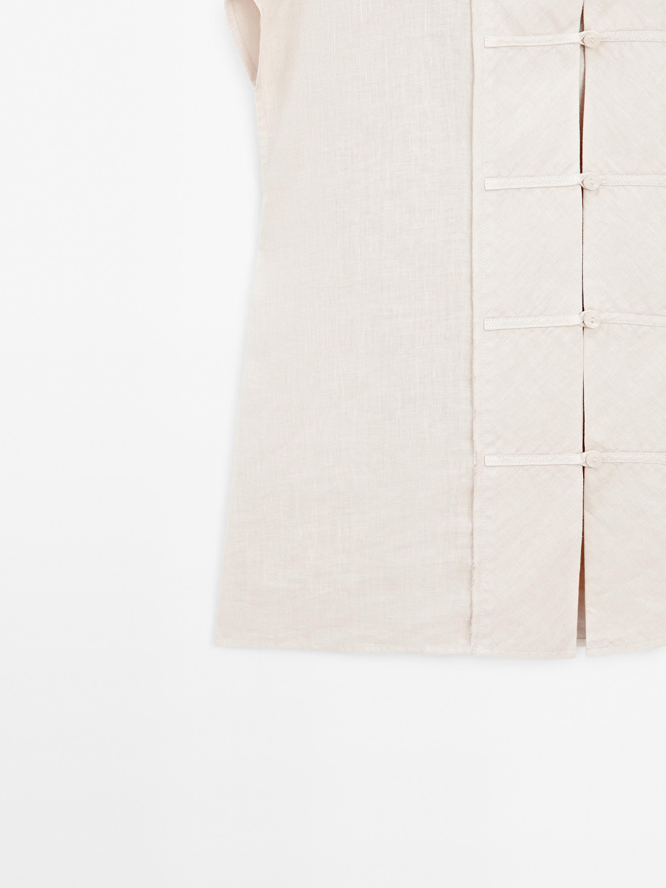 Waistcoat with buttoned chest detail